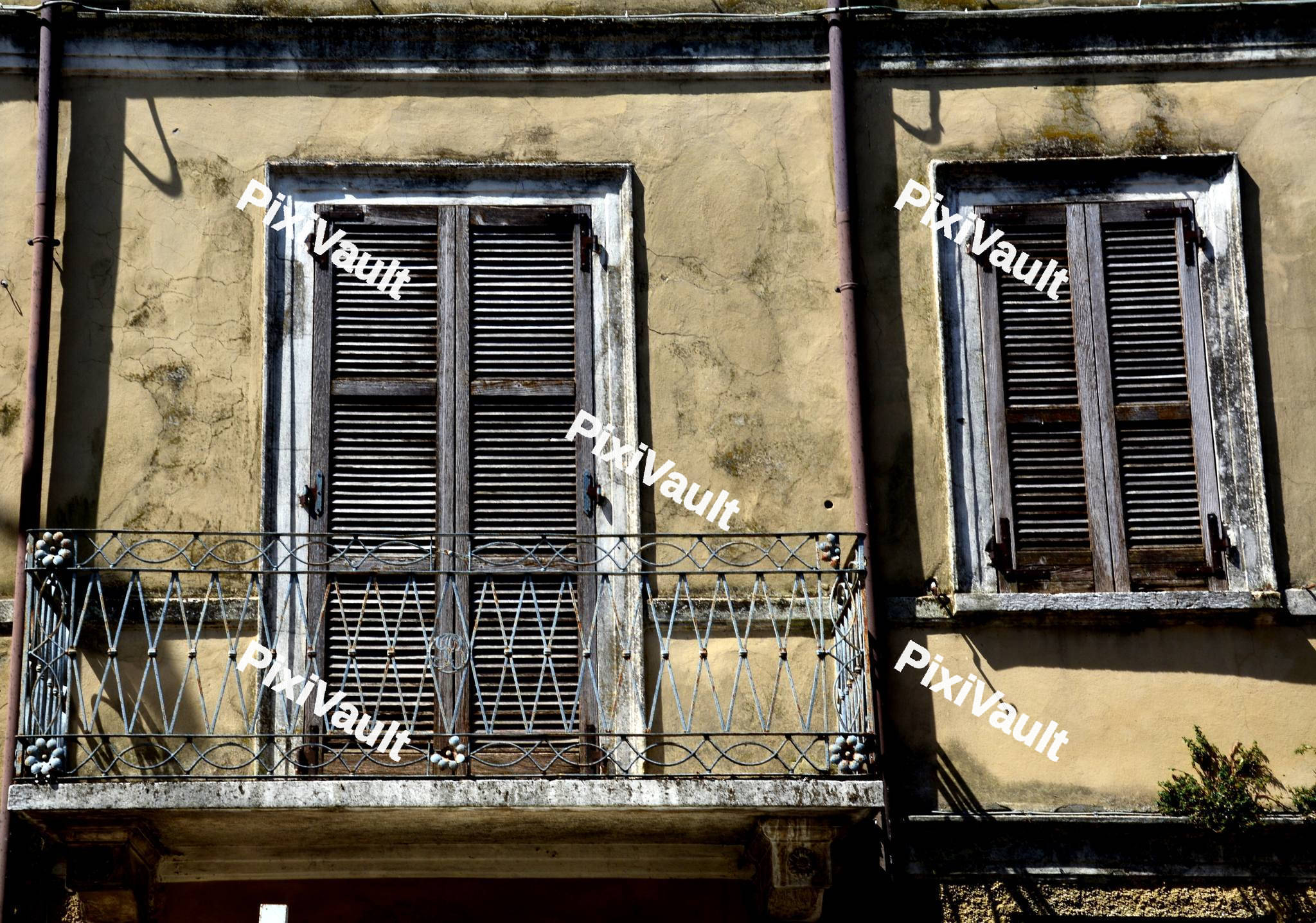 Old Windows with Shutters